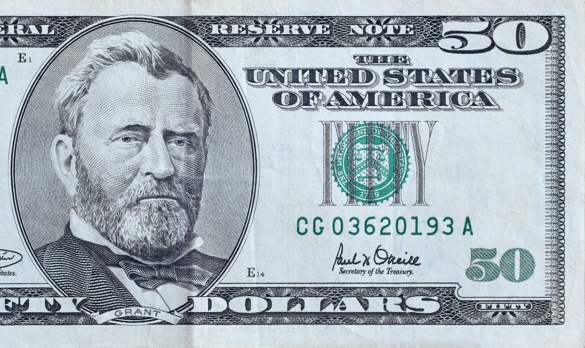 Portrait of US president Ulysses Simpson Grant on 50 dollars banknote closeup macro fragment