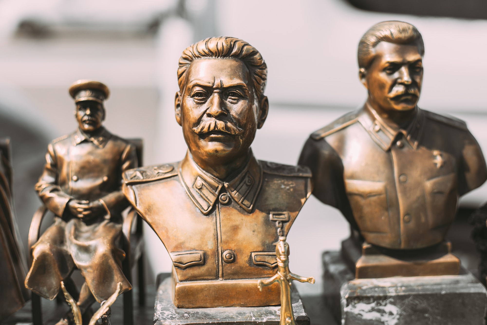 Soviet Leader Josef Stalin. Concept Of Nostalgia For Soviet Union. Miniature Bronze Figurines Of